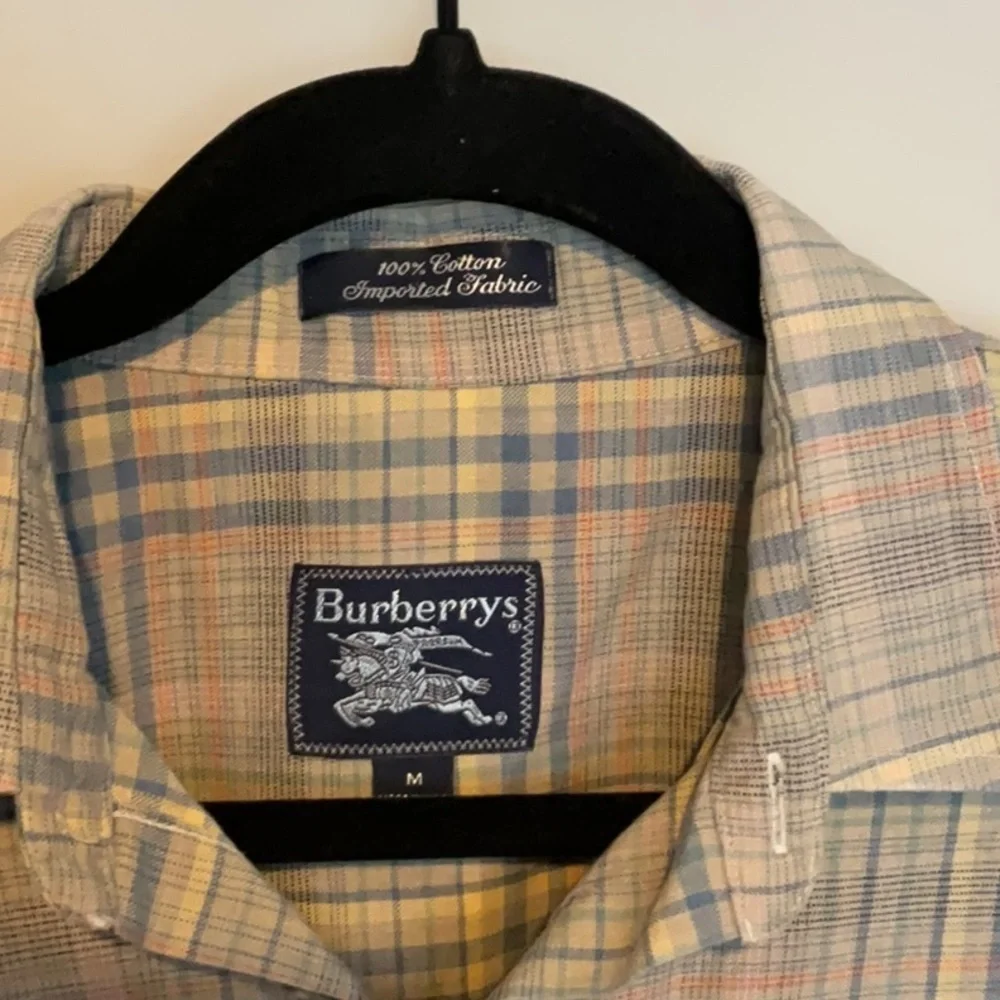 Burberry plaid collared button down, 100% imported cotton size Medium